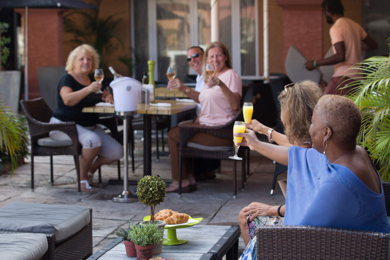 guests toasting rendez vous lounge st maarten