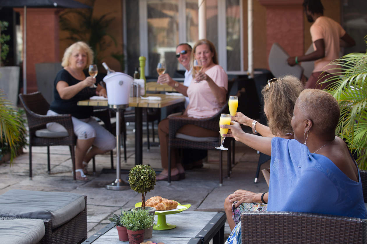 guests toasting rendez vous lounge st maarten